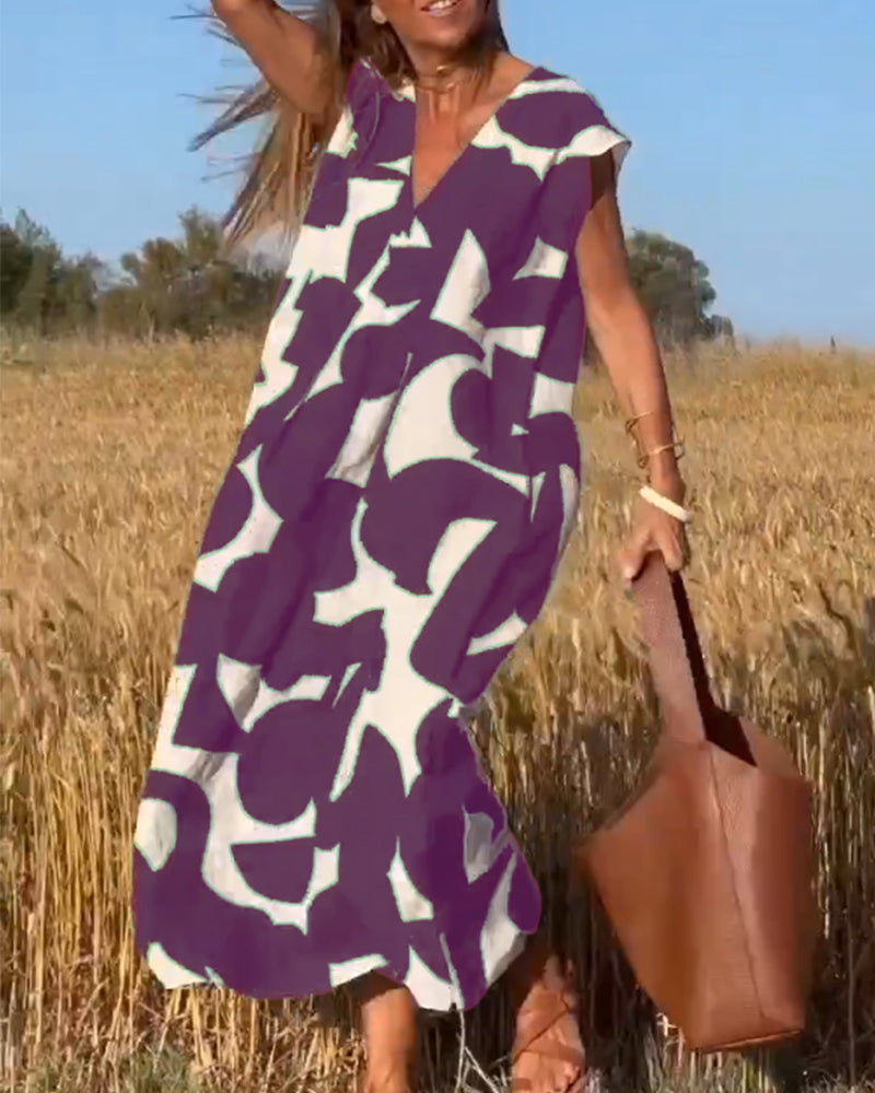 NINA – V-Ausschnitt Maxikleid mit Druck und Flügelärmeln