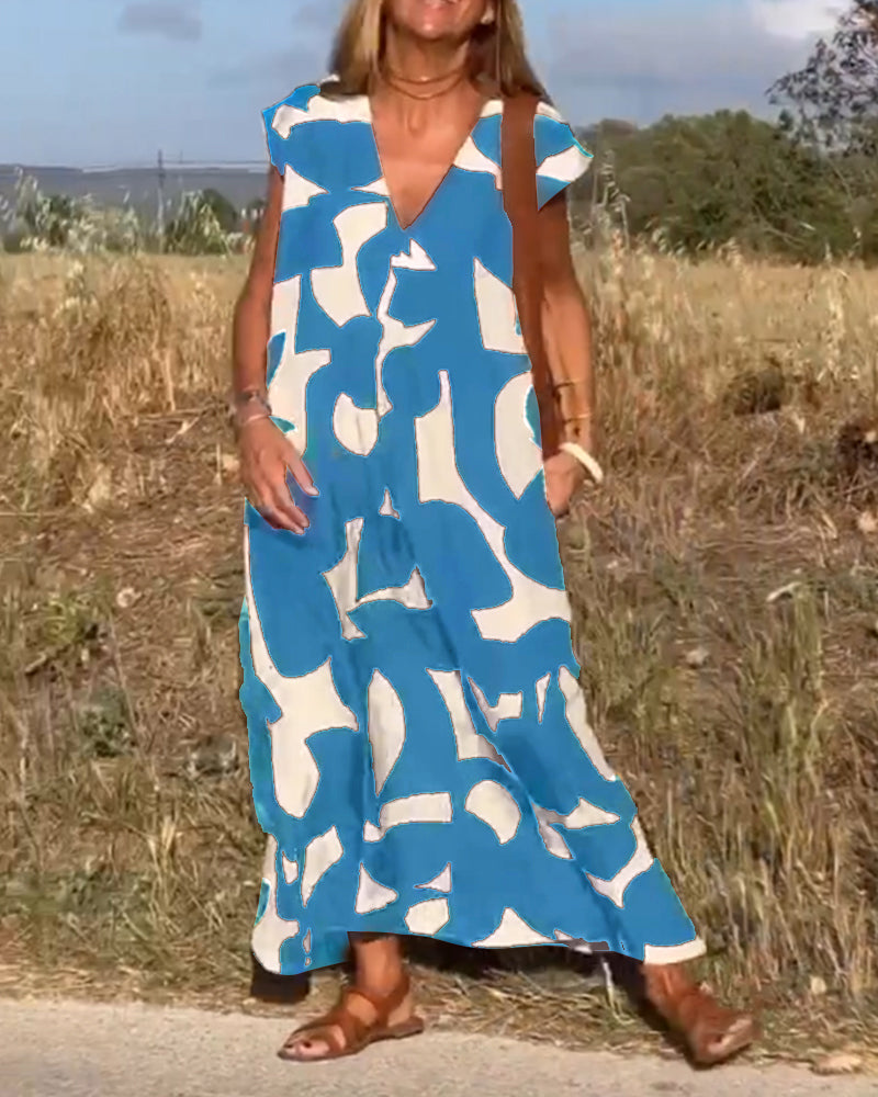 NINA – V-Ausschnitt Maxikleid mit Druck und Flügelärmeln