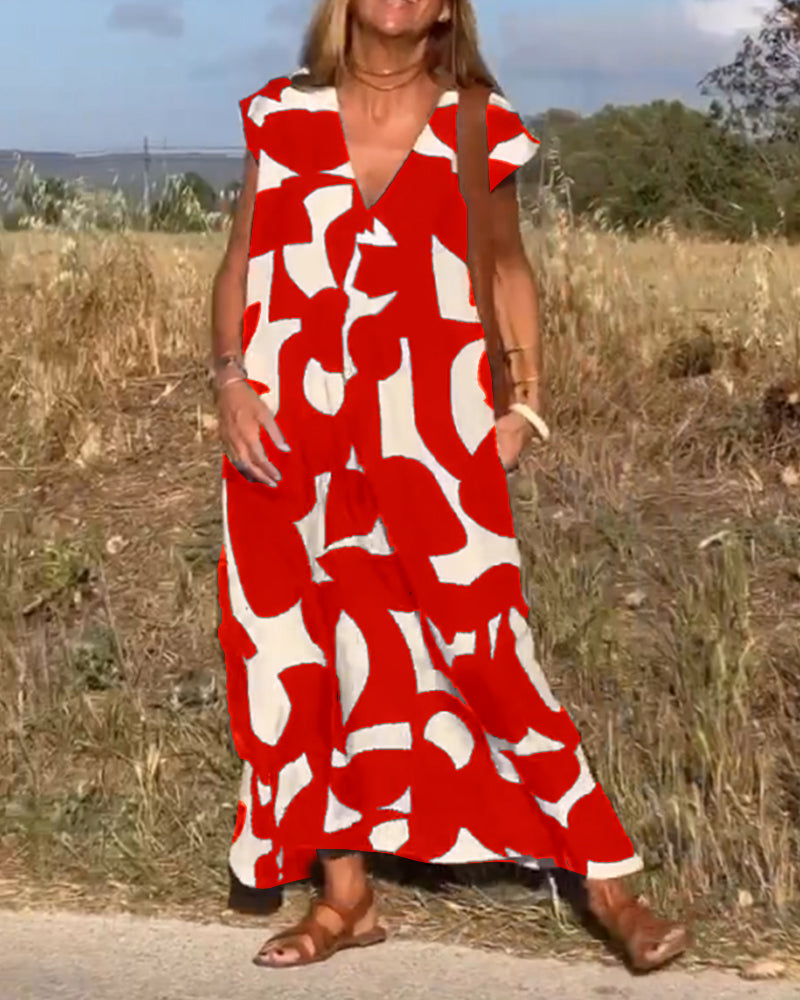NINA – V-Ausschnitt Maxikleid mit Druck und Flügelärmeln