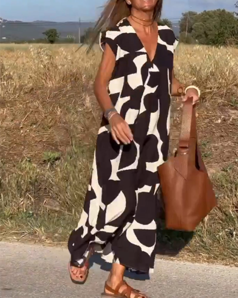 NINA – V-Ausschnitt Maxikleid mit Druck und Flügelärmeln