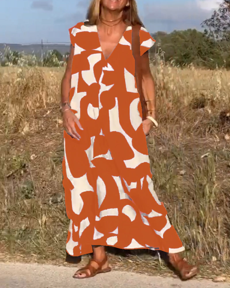 NINA – V-Ausschnitt Maxikleid mit Druck und Flügelärmeln
