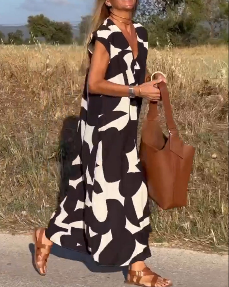 NINA – V-Ausschnitt Maxikleid mit Druck und Flügelärmeln