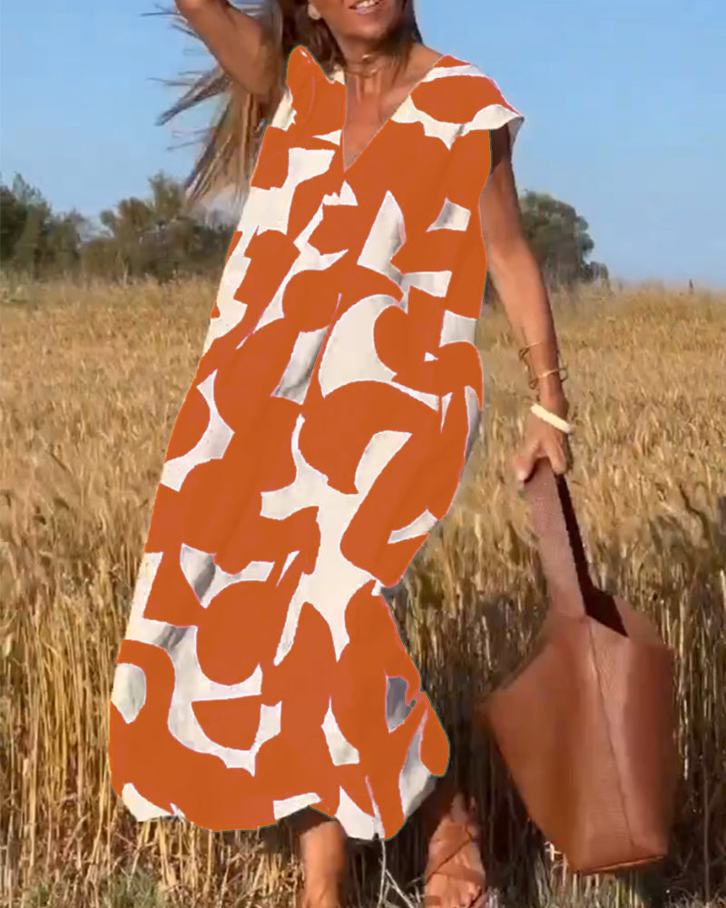 NINA – V-Ausschnitt Maxikleid mit Druck und Flügelärmeln