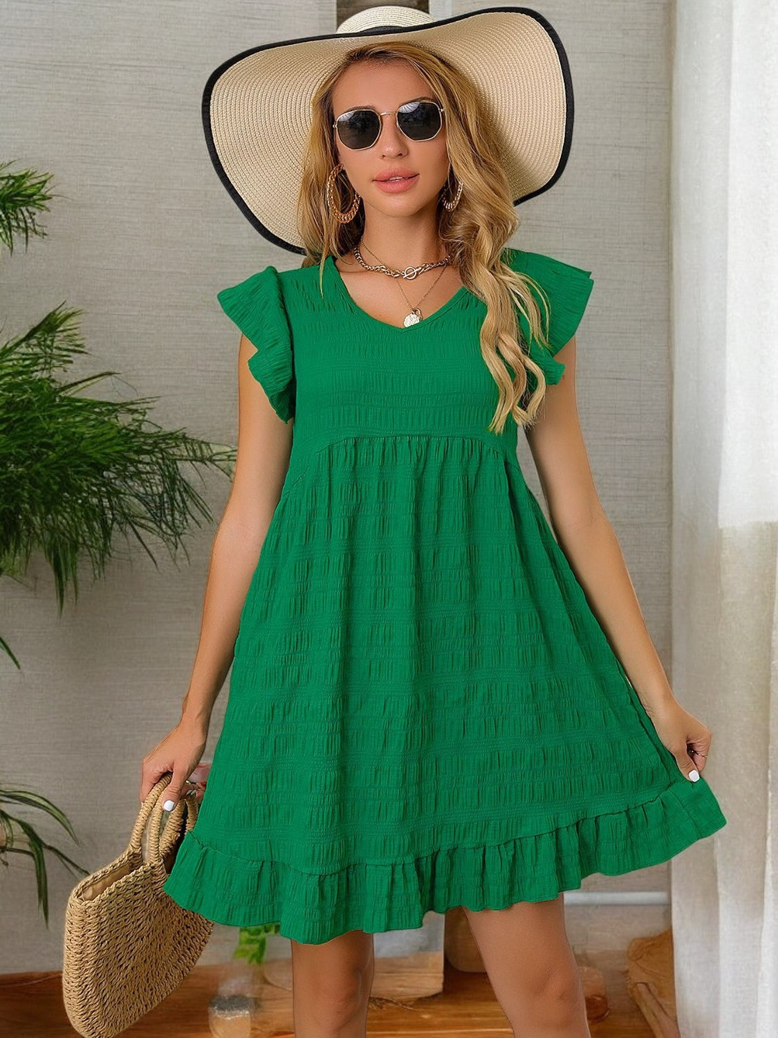 SUNNY MINI DRESS – Kurzes Kleid mit Rüschensäumen und ärmellosem Design