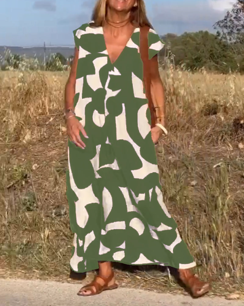 NINA – V-Ausschnitt Maxikleid mit Druck und Flügelärmeln