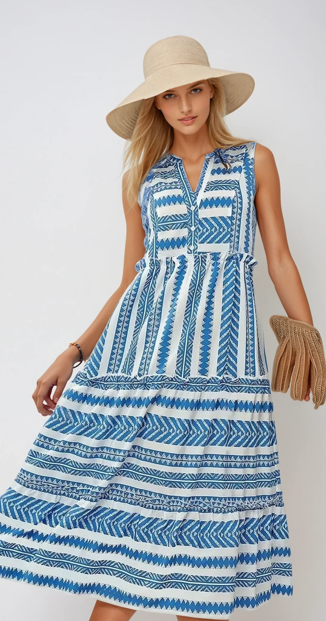 SUNLIT – Ärmelloses Sommerkleid mit Fransen und Lichtspiel